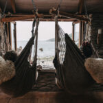 swinging chairs in the beach hut